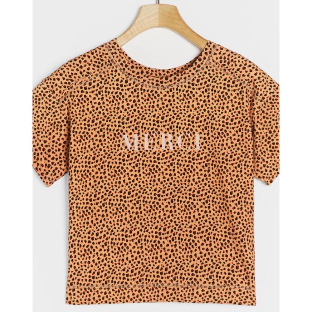 Merci please! Anthro tee lightly worn in fun cheetah with pink writing. S.